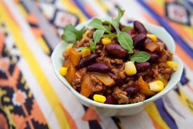 Chili con carne. Traditional mexican spicy beef dish. Minced beef cooked with red kidney beans, sweetcorns and red really hot chillies.