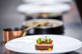 Plates of food at Disney's First Michelin-Starred Restaurant.