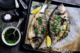 Broiled dorado and herbs. 