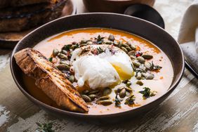 Pumpkin soup with poached egg.