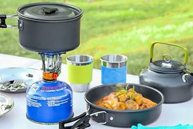 The Odoland 15pcs Camping Cookware Mess Kit on a table outdoors