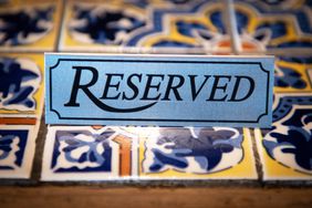 A reserved placard on a table.