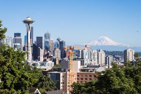 The skyline of Seattle, featuring the Space Needle and Mount Rainier