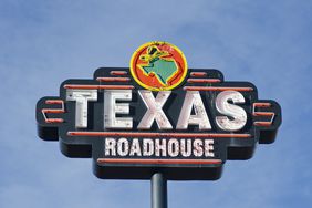 A Texas Roadhouse restaurant sign.