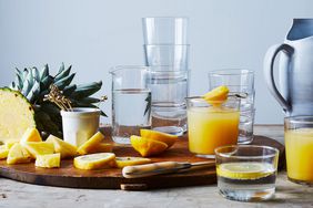 Bormioli Rocco Stackable Bodega Glasses arranged on a table with fruit